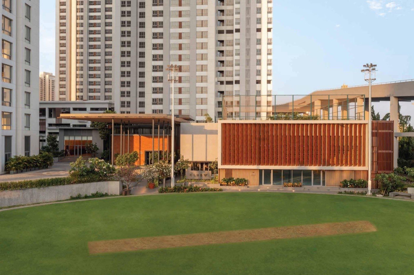 Clubhouse and cricket lawn at Piramal Vaikunth